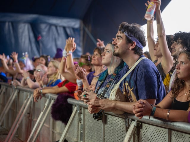 Fans watch acts perform on the Solasta Stage at the Shambala Festival. Photo by David Jackson.