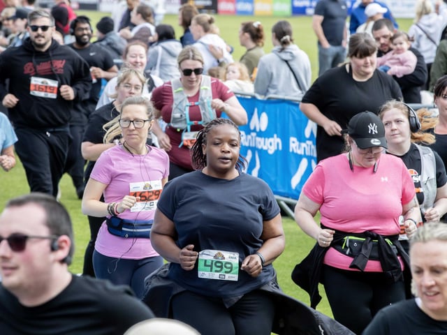Hundreds of runners braved showers and wind to take on the race on Sunday (May 25), which started and finished at Sixfields stadium.