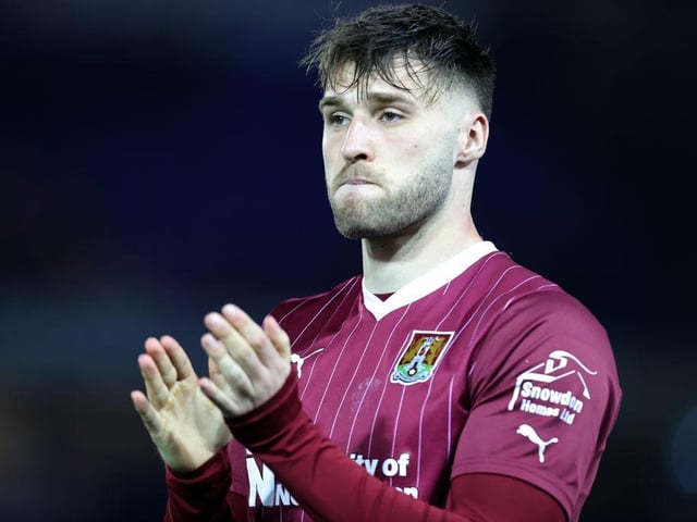 The defender has joined EFL new boys Rochdale on a one-year deal after an injury-disrupted two years with MK Dons