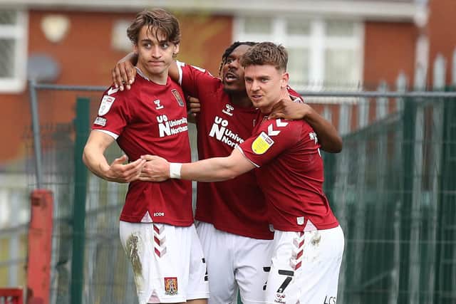 Louis Appere doubled Cobblers' lead at Oldham on Good Friday. Pictures: Pete Norton.