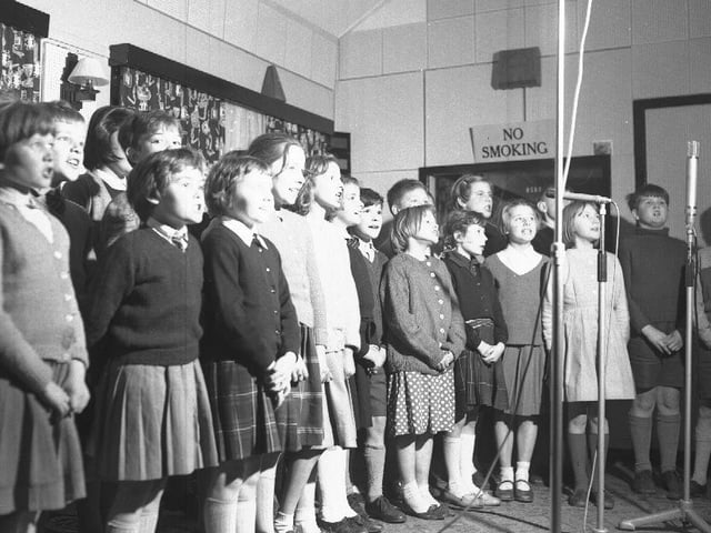 A children's choir in a recording studio in Northampton