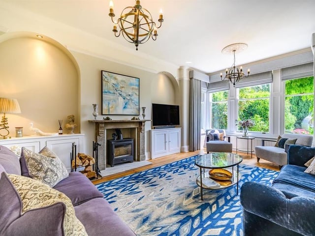 This Victorian home has a tennis court, huge gardens and a private mooring on the River Nene.