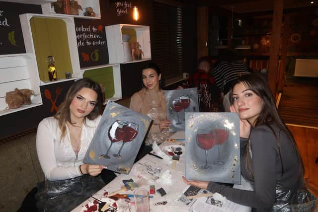 Painters with the Cheers painting
