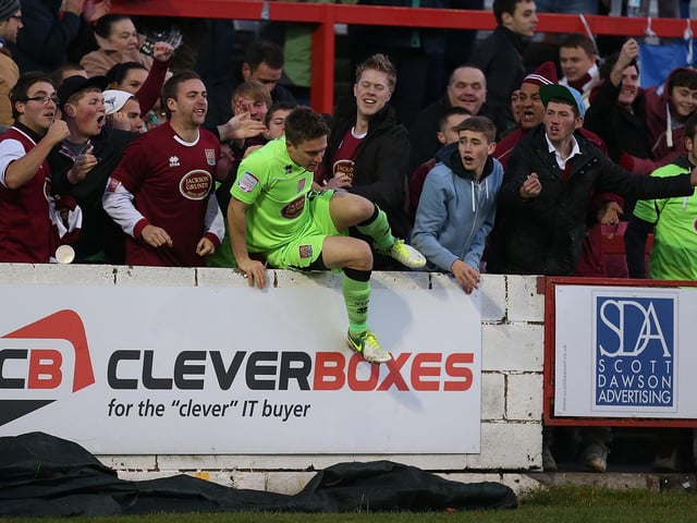 2012: Jake Robinson of Northampton Town celebrates after scoring his sides 2nd goal during the npower League Two match between Accrington Stanley and Northampton Town at The Crown Ground on November 10, 2012 in Accrington, England. (Photo by Pete Norton/Getty Images)