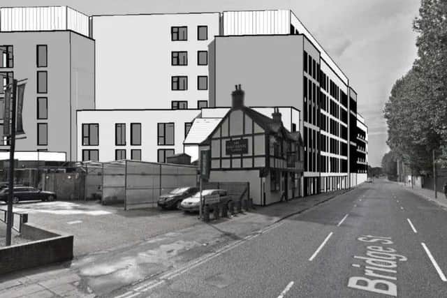 This is an artist's impression of what the flats could look like next to the Malt Shovel pub