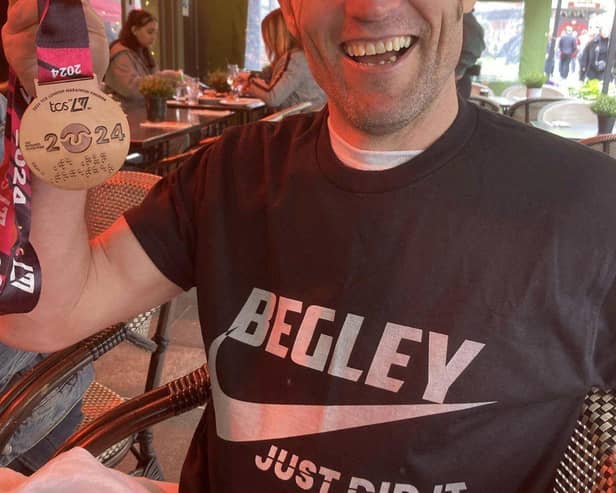 Tony Begley Celebrating completing The London Marathon in aid of The Lowdown.