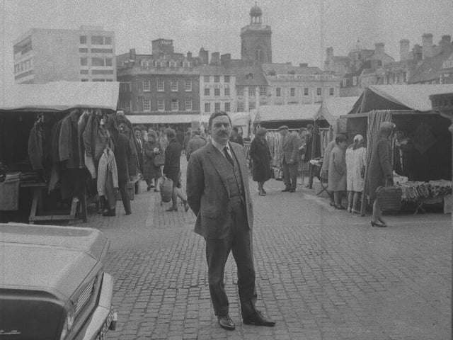 A well-dressed man on Northampton Market Square
