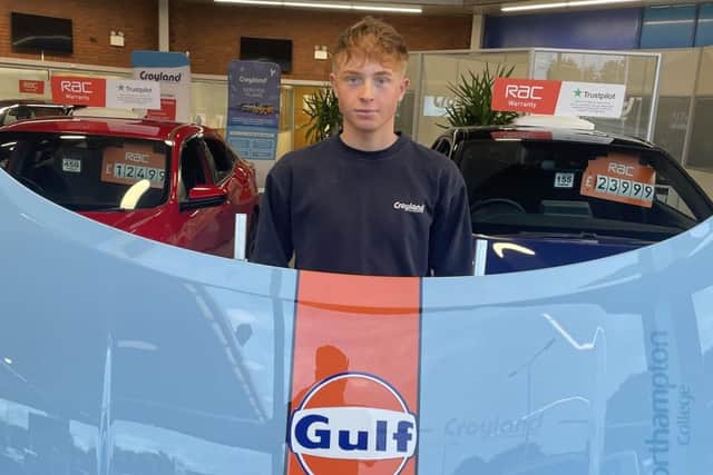 Matt Smith with his paintwork piece on display at the Cropland showroom.
