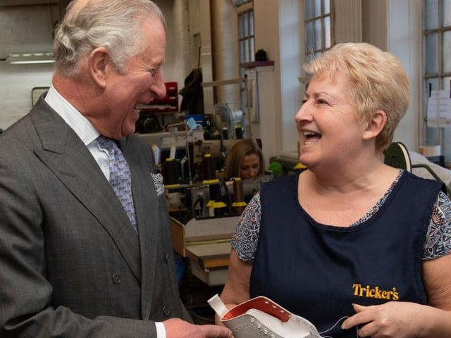 Prince Charles speaks to Carol Griffiths as he visits Tricker’s on the occasion of its 190th year on January 28, 2019