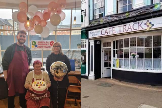 (Left to right) Alfie, Sue and Cafe Track's manager Sharon all celebrated the business' four year anniversary on April 14, 2023.