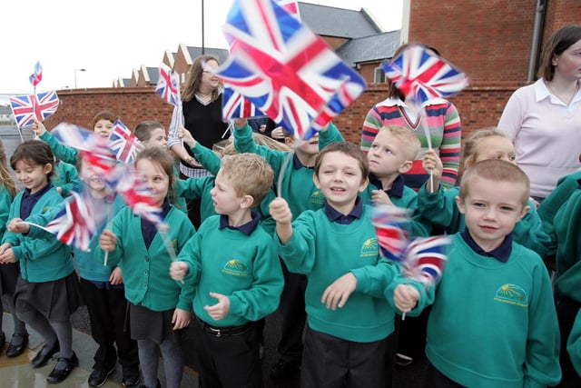 Children ready to greet the Prince of Wales at Upton Meadows School