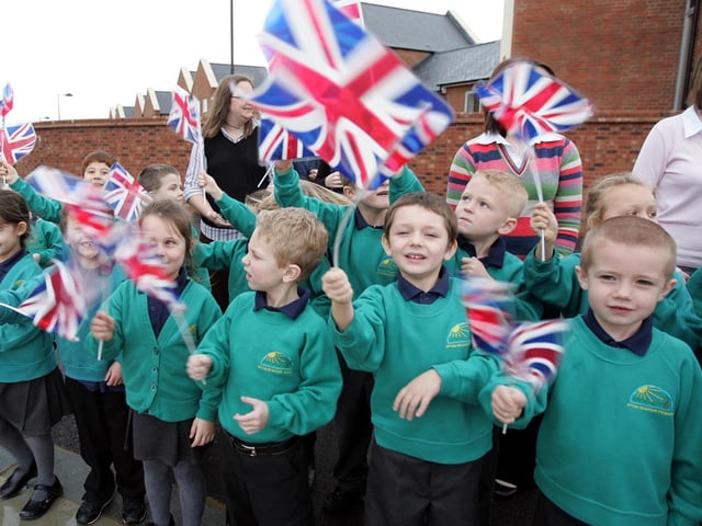 Children ready to greet the Prince of Wales at Upton Meadows School