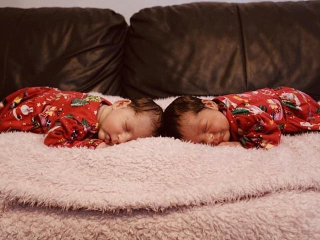 One-month-old Sara and Emily.