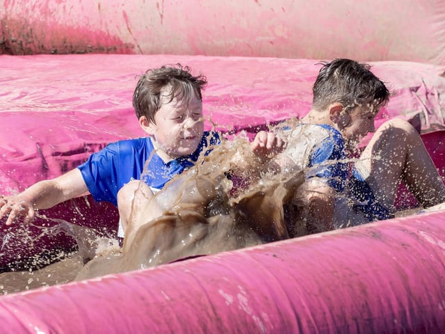Children were all smiles on Saturday July 12 when they took part in the Race for Life, five kilometre obstacle course in Abington Park, Northampton.