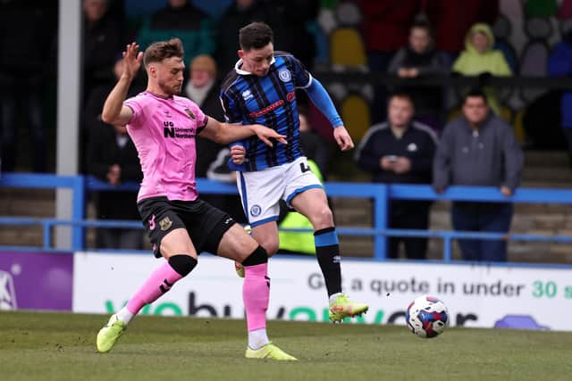 Cobblers defender Sam Sherring contests for the ball with Rochdale's Ian Henderson (Picture: Pete Norton/Getty Images)