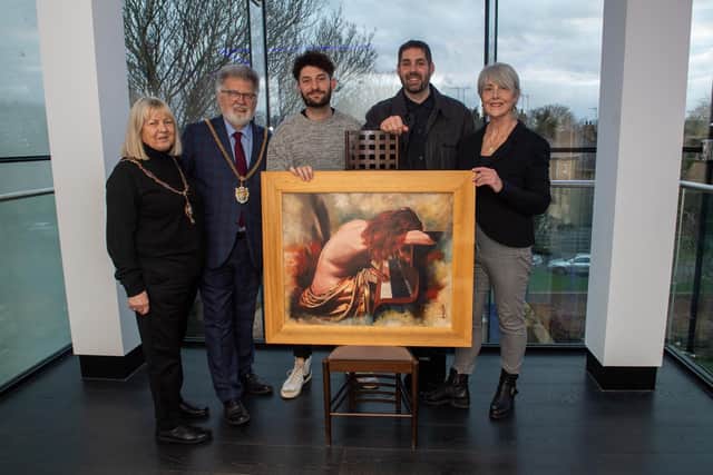 Northampton Mayoress Liz Cox, Mayor Stephen Hibbert, Billy Lockett, photographer Gavin Wallace and 78 Derngate House Manager Liz Jansson pictured with one of the pieces of artwork by John Luce Lockett which will feature in the exhibition. Photo by David Jackson.
