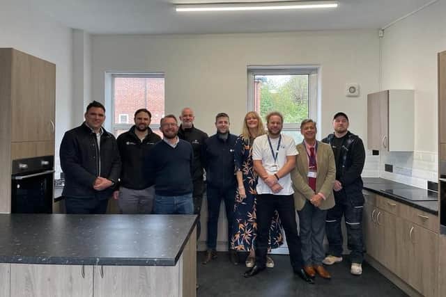 Mind staff and Fortem employees in the new kitchen