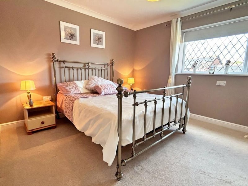 One of six luxurious bedrooms in the property