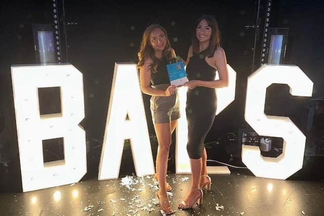Co-Directors Charlotte Ashby & Kimberley Suter receiving their award.