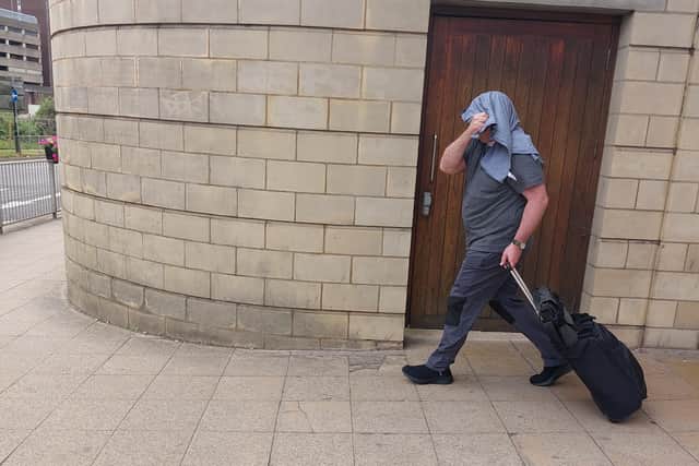 John Youd changed clothes and put them over his head to dodge the Northants Telegraph cameras.