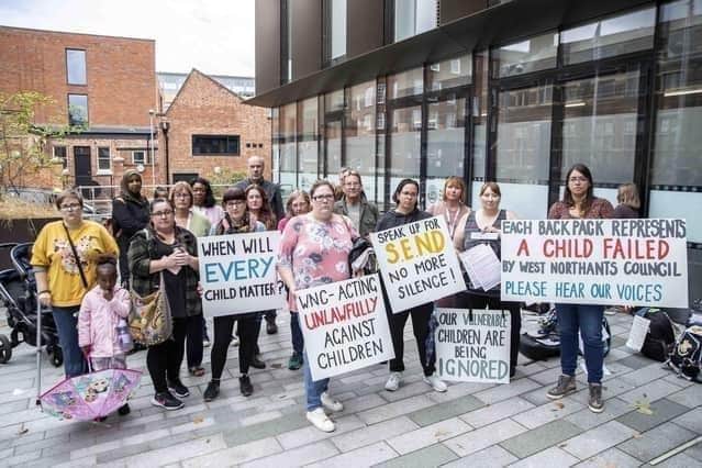 Here are some of West Northants Action Group parents protesting outside WNC's Angel Square offices in March 2023