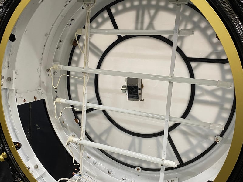 The clock's drum has had a top coat of black gloss paint.