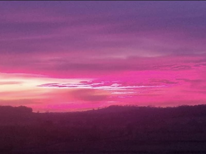 A lot of pink and purple in the sky - taken from between Towcester and Weedon.