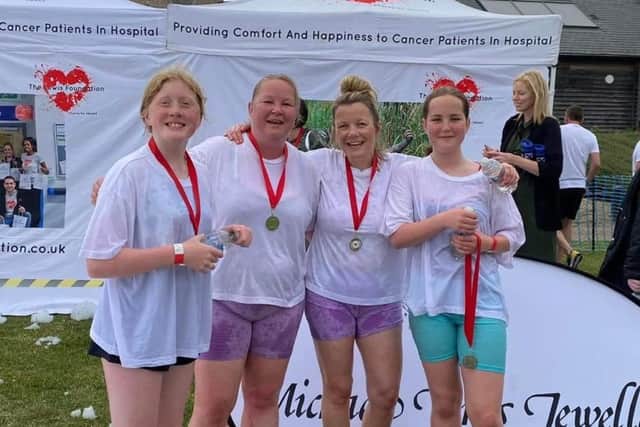Photo shows finish line competitors from the 2022 event.
