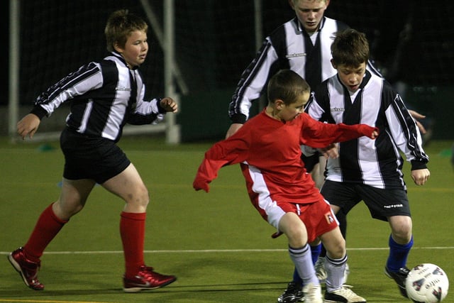 Football action from Vernon Terrace Primary School (black and white) v Chiltern Primary School (red).