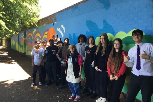 Students from Northampton International Academy, who are also members of the NN Streetballerz basketball initiative, have enhanced an area of The Racecourse.