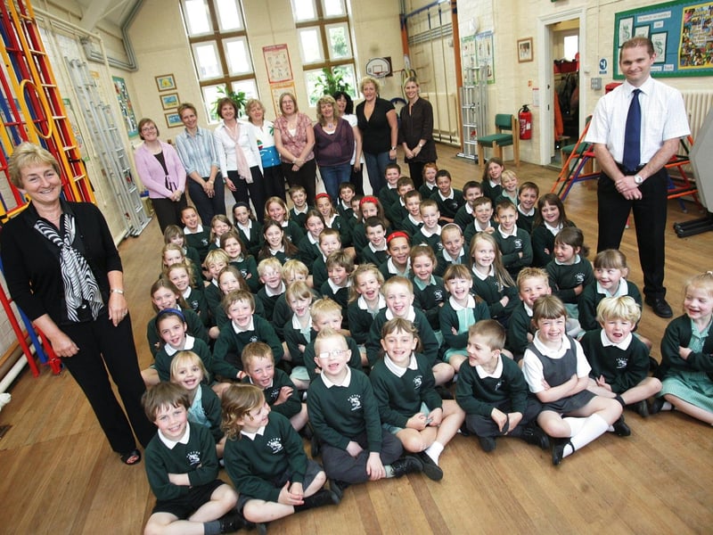 The whole of Gayton Primary School (60 pupils) with Head Teacher June Wyhiwskyj and staff. LEFT TO RIGHT (Staff & Parent Helpers) are June Wyhiwskyj (front), Shirley Quick, Helen Thomas, Helen Gowler, Carrie Yuen, Jane Addison, Mary Milicevic, Shirley Payne, Jane Wheeler, Jo Parslow and lastly Matthew Green