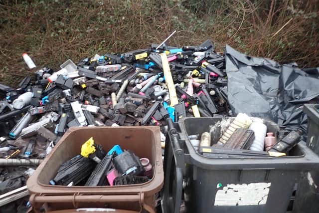 The pair burned material without permission and stored mixed waste illegally on the site.