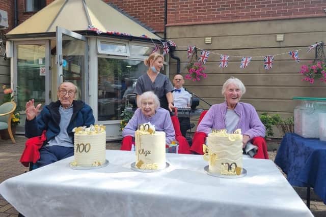 The care home residents celebrated with staff and family.