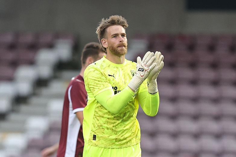 Lee Burge produced a good save in the first half before his late replacement, Ross Fitzsimons, made an even better stop in the closing stages