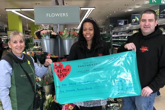 Pictured: Lorraine and Lee Lewis collecting the donation from Waitrose Kingsthorpe