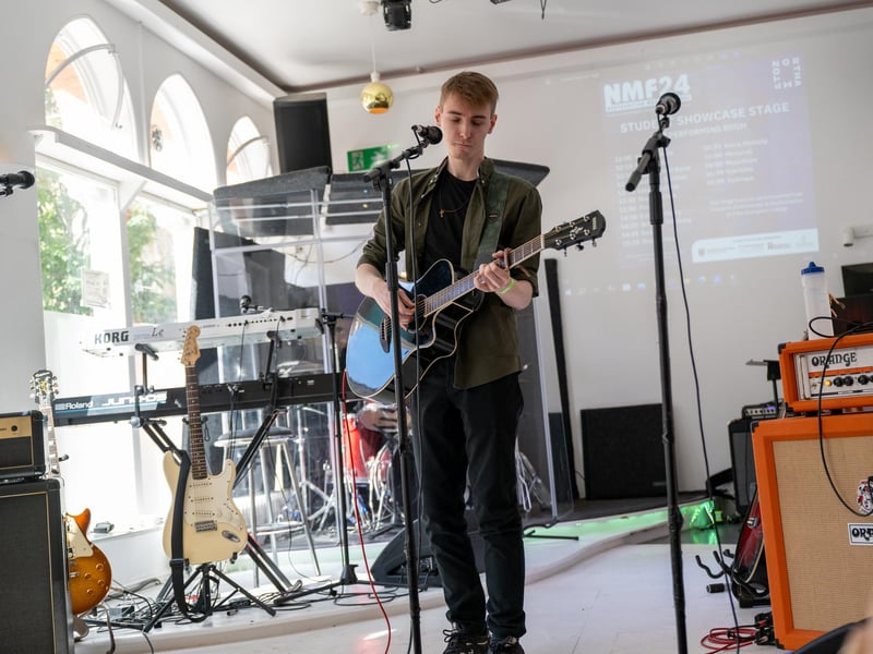Edward Druery performing on the Student Showcase Stage at the Northampton Music Festival on Sunday, September 8, 2024. Photo by David Jackson.