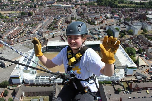 School girl abseiling
