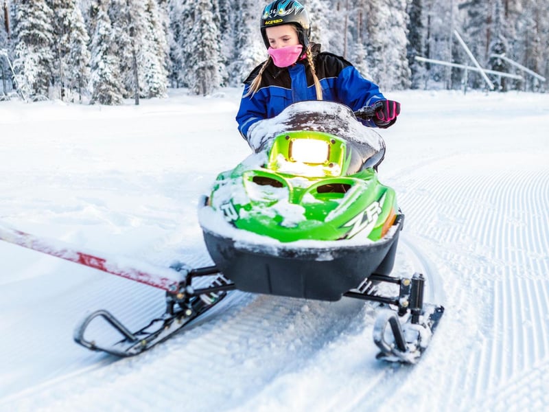 A snowmobile ride is so much fun for children and adults too