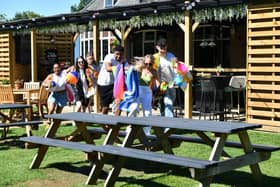 The Spinney Hill pub allows customers to reserve seats in its beer garden - using a beach towel.