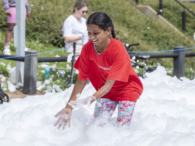 A family-friendly fun run, with water slides and obstacles, took place at Upton Country Park on Saturday (August 12) to raise funds for a Northampton charity.