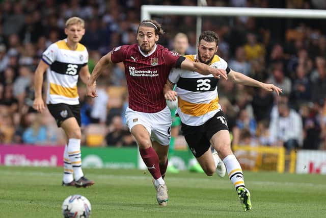 Louis Appere battles for possession during the Cobblers' 1-0 defeat at Port Vale on Saturday (Picture: Pete Norton/Getty Images)