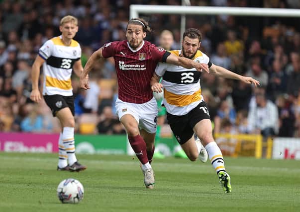 Louis Appere battles for possession during the Cobblers' 1-0 defeat at Port Vale on Saturday (Picture: Pete Norton/Getty Images)