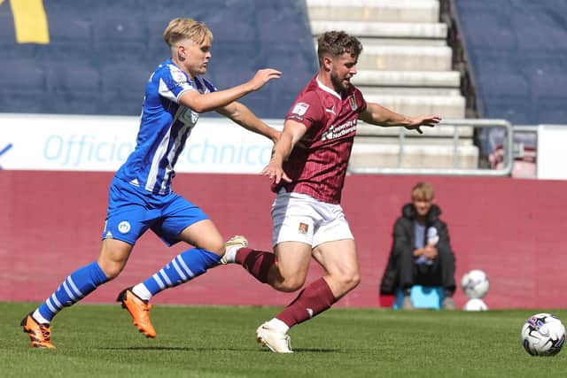 Jack Sowerby in action for the Cobblers during their 2-1 defeat at Wigan Athletic in August (Picture: Pete Norton/Getty Images)