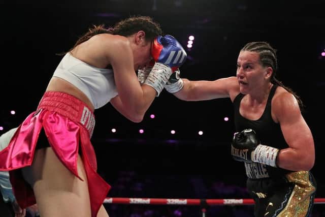 Chantelle Cameron punches Elhem Mekhale during the WBC Interim World Super Lightweight title fight between the pair on Saturday (Picture: Ryan Hiscott/Getty Images)