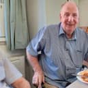 Age UK Northamptonshire's client Jim enjoying a second helping of sausage, beans and chips