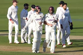 George Bartlett (left) and Ben Sanderson walk off the pitch after guiding Northants to a draw against Lancashire (Photo by David Rogers/Getty Images)
