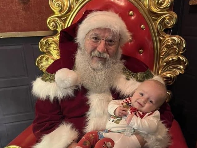 Luca, who is almost five months, meeting Santa for the first time.