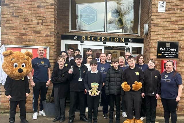 Students from Northgate School Academy Trust and the TMDF team celebrating the donation together