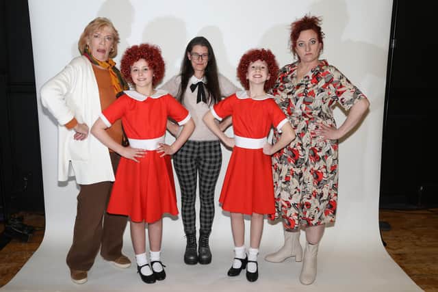 Jo Pennell and SydneyBeau Pettigrew and Elsie-Mae Mander stars of Annie in 1995 and 2025 With Miss Hannigans Susan Moore and Esther Underwood Castle Theatre Wellingborough /National World