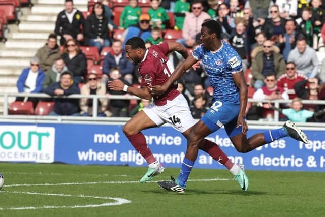Ali Koiki speeds past Josh Emmanuel on his way to a brilliant solo goal against Carlisle